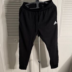 Adidas Black Basketball Joggers
Size XL